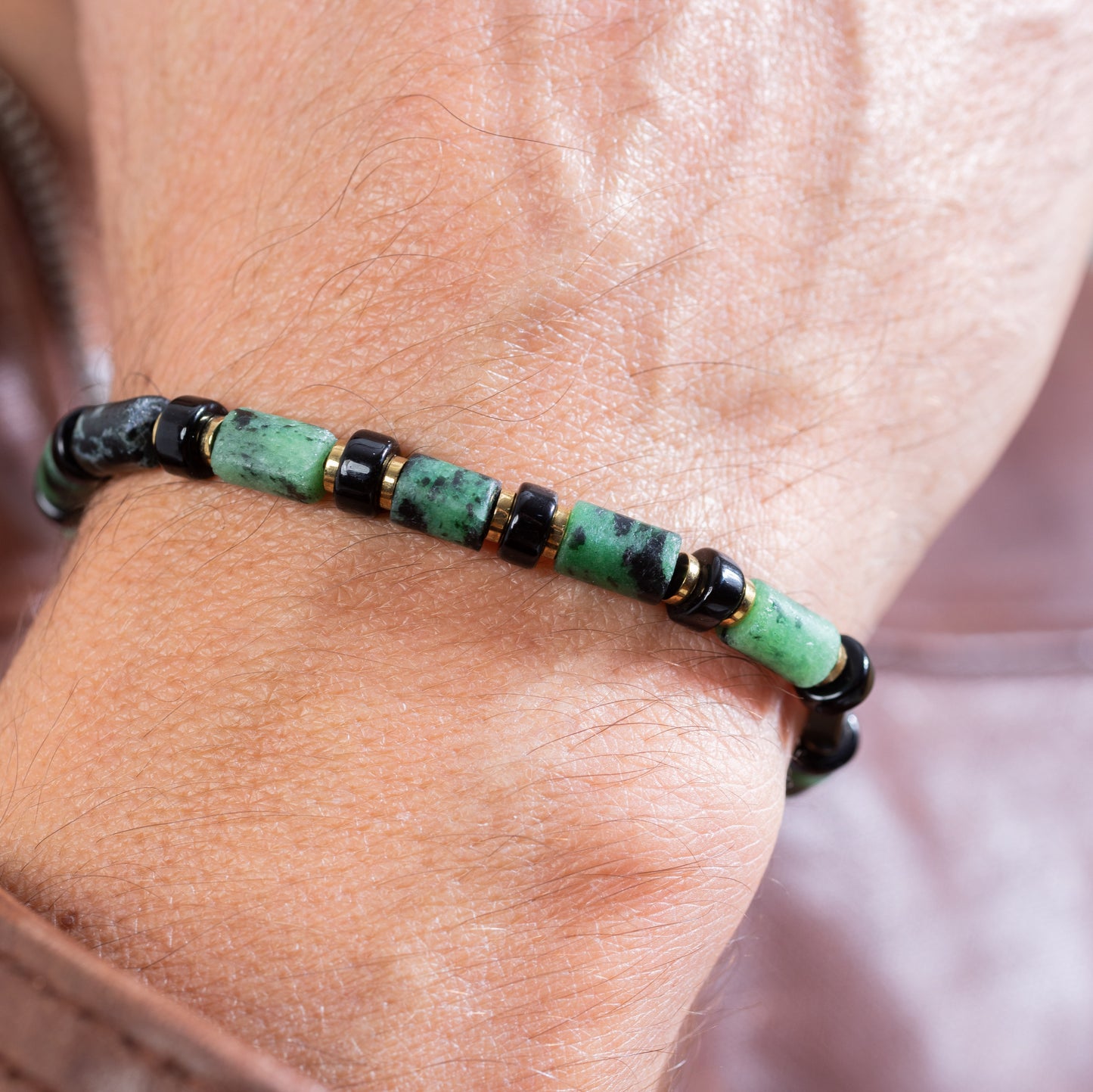 Zoisite cylindrical beads close up