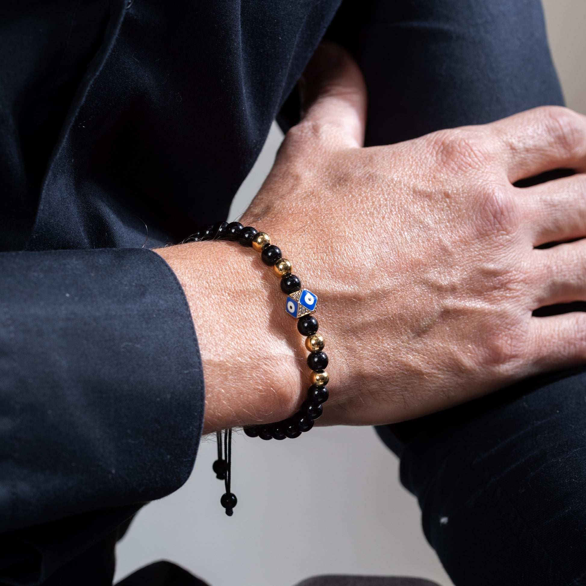 Evil eye with golden beads and onyx bracelet