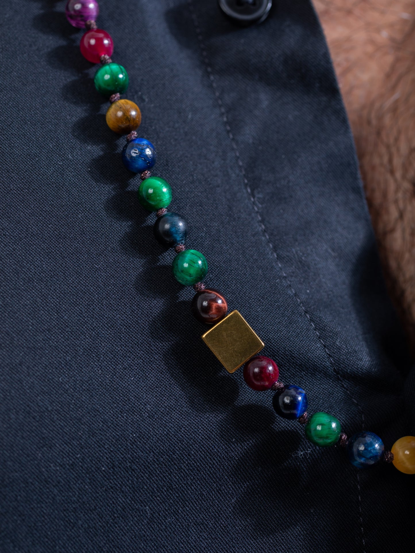 Yellow Tiger eye and onyx necklace close up